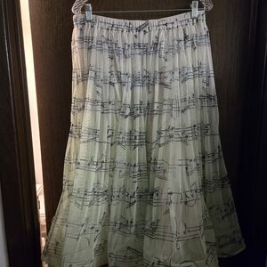 Maeve Cream Pleated Midi Skirt with Black Music-Note Print